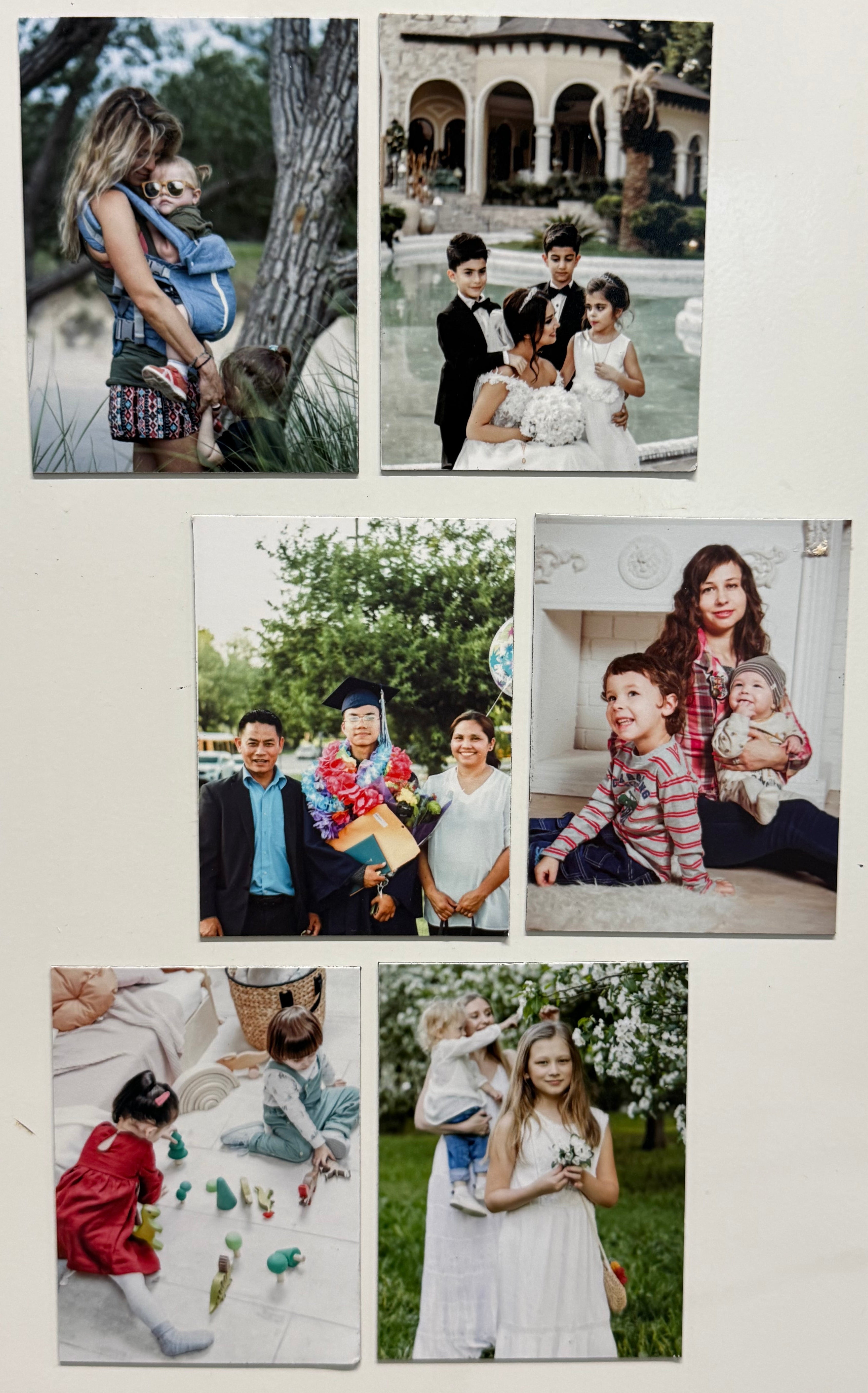 Collage of family photos on a white wall