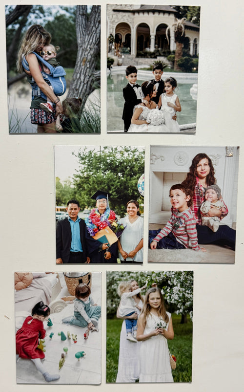 Collage of family photos on a white wall