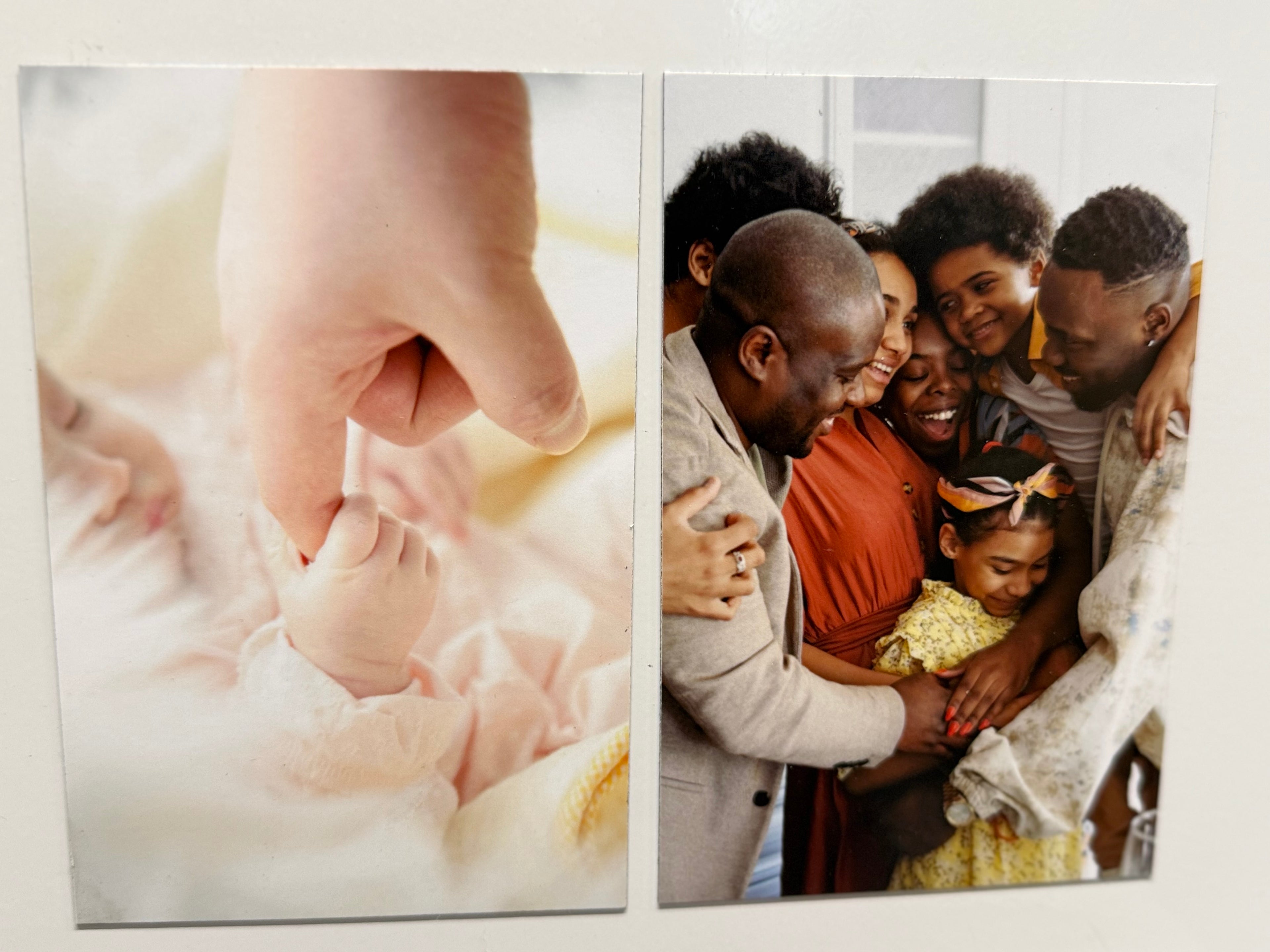 Two images side by side; one of a hand holding a baby's hand, the other of a family hugging.